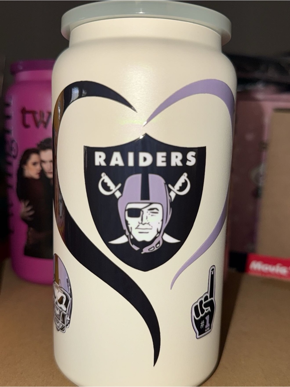 Riders by Lee Cream Can Cooler with Black and Lavender Raiders Heart